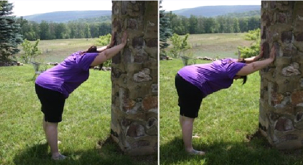 Exercise of the Day: Downward Facing Dog on Wall