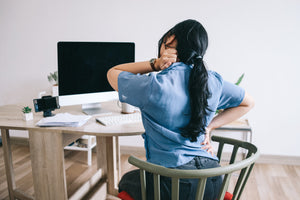 Why sitting on hard surfaces causes back pain and how cushions can help