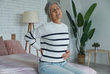 Why Women Over 40 Often Experience Stomach and Back Pain Together